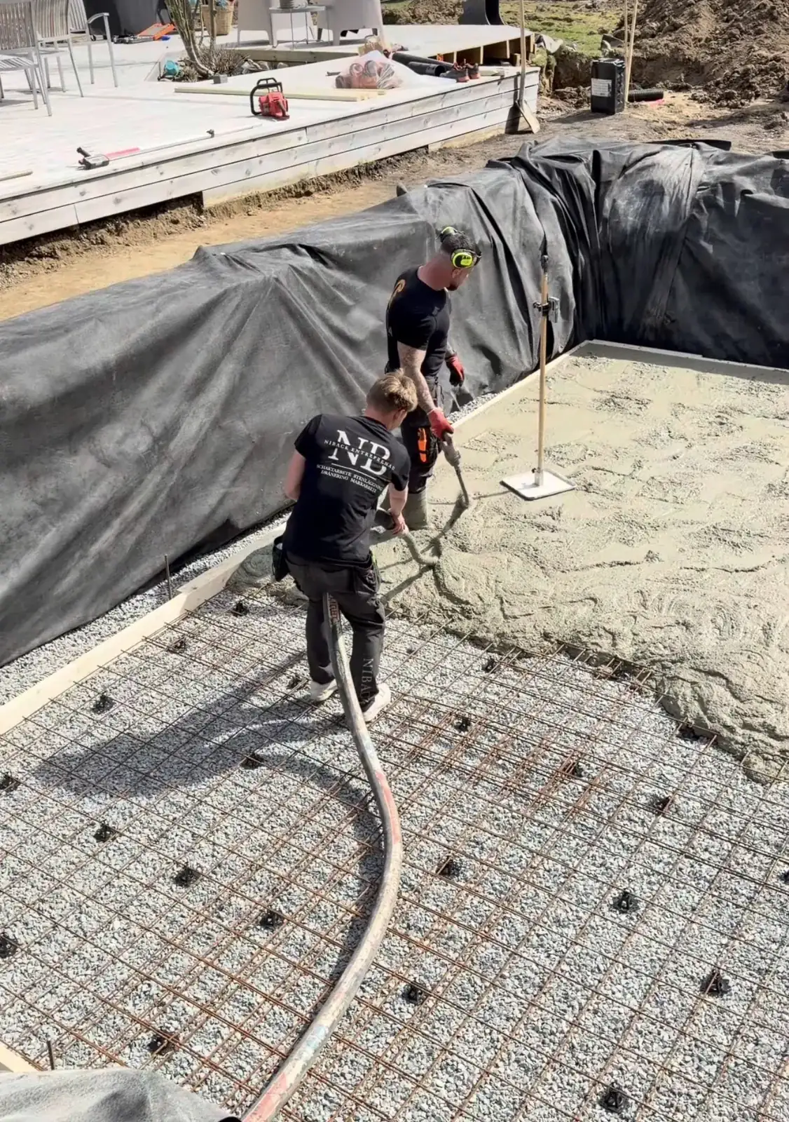 Armering och gjutning av poolplatta vid villa i Täby